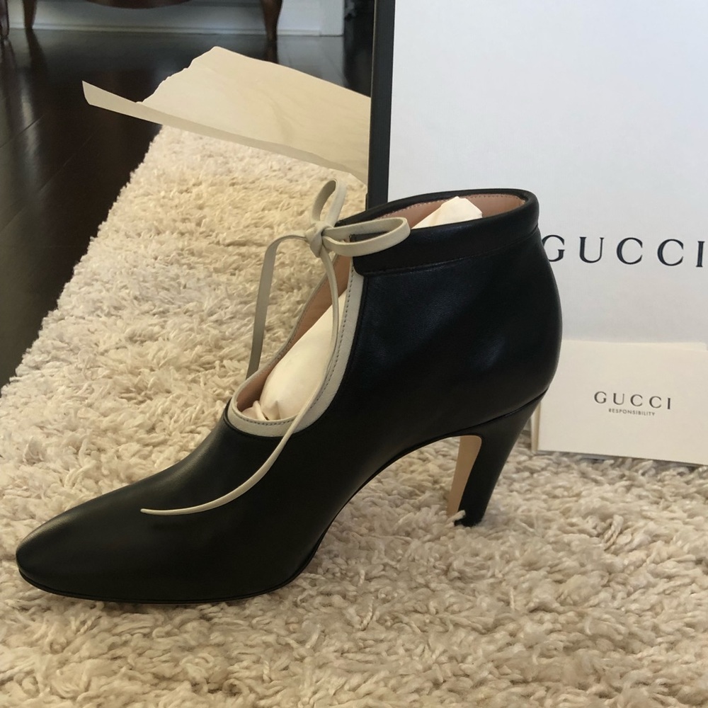 Brand new Leather ankle boots by Gucci.